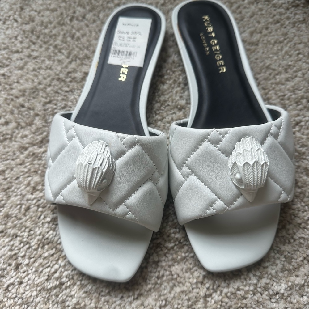 New Kurt Geiger White Quilted Mules eagles head logo.